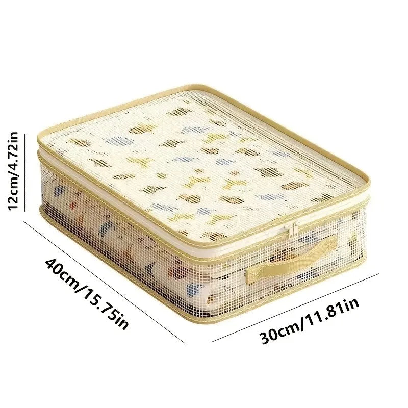 A beige foldable storage bag with a mesh top and bottom, designed for storing blankets or bedding.