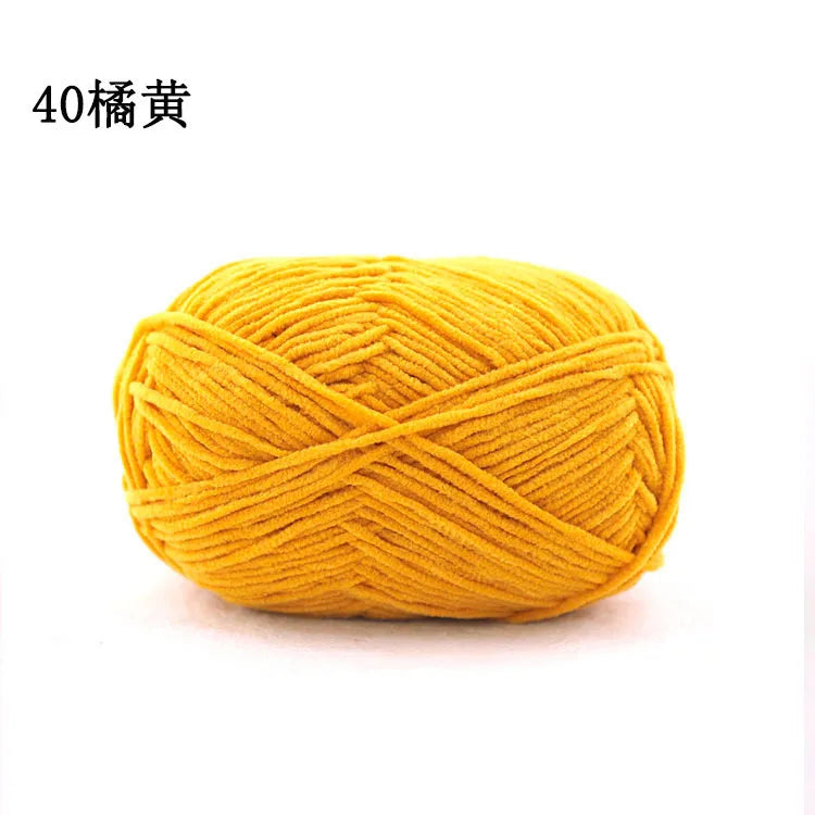 A ball of bright yellow 40 strands of matte chenille yarn for knitting and crochet