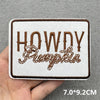 A square embroidered patch featuring the text HOWDY Pumpkin