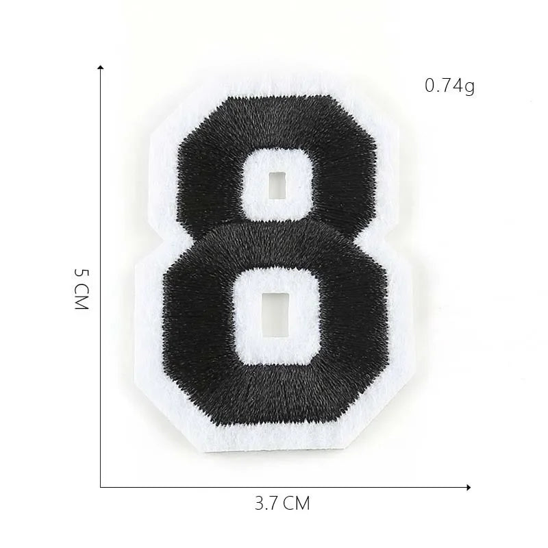 A black embroidered number 8 patch with a white border and a small white square cutout.