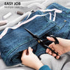 Hands are using heavy duty industrial tailor scissors to sew multiple layer denim fabric.