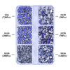 A clear plastic container holding various sizes and colors of glass rhinestones, including SS6, SS10, and SS20.