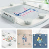 A set of magnetic embroidery hoops and pins used for sewing machines, shown in various colors and designs.