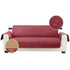 A maroon sofa slipcover with a quilted pattern and a circular detail showing the reverse side.