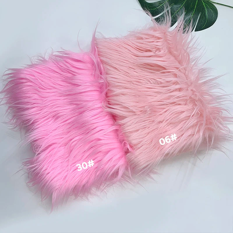 Two fluffy pink faux fur fabrics labeled 30 and 06 are displayed on a white background.