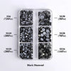 A clear plastic tray holds various sizes of black diamond glass rhinestones categorized by SS6, SS10, SS16, SS20, and SS30.