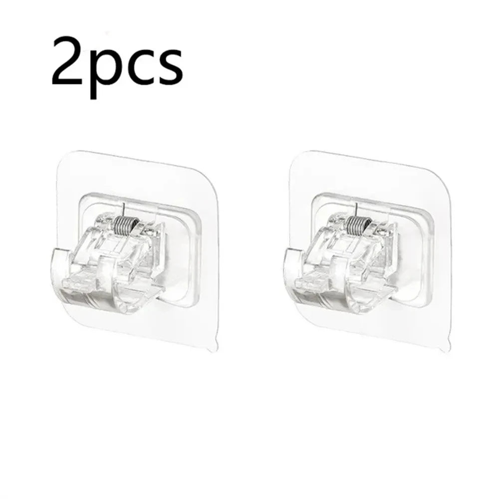 Two clear self-adhesive curtain rod clips for windows and walls.