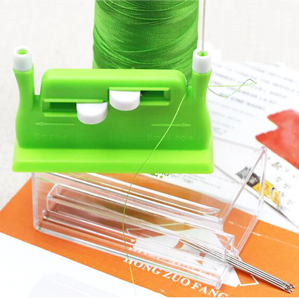 A bright green automatic double-head sewing needle threader device with a clear plastic holder is shown.