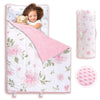 A pink toddler nap mat set featuring a quilted blanket, a matching pillow, and a stuffed animal.