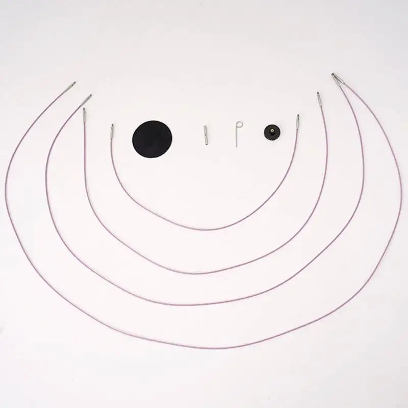 A set of interchangeable round knitting needles in a muted pink color, laid out on a white background.