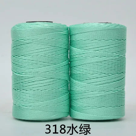 Two spools of light mint green hand knitting and crochet cord for crafting