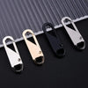 A set of universal replacement zipper pullers in silver and gold colors displayed on a dark surface.