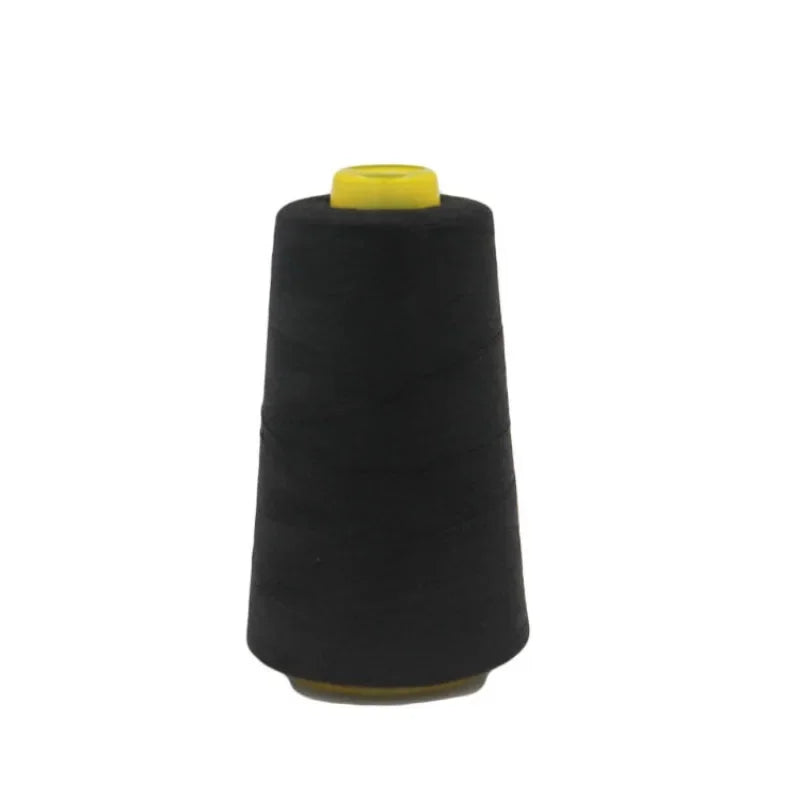 A spool of black polyester sewing thread with a yellow core.