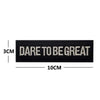 Black embroidered patch with the text DARE TO BE GREAT, measuring 10cm long.