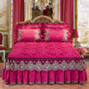 A vibrant pink satin bed skirt set featuring a ruffled hem and matching pillowcases on a bed.
