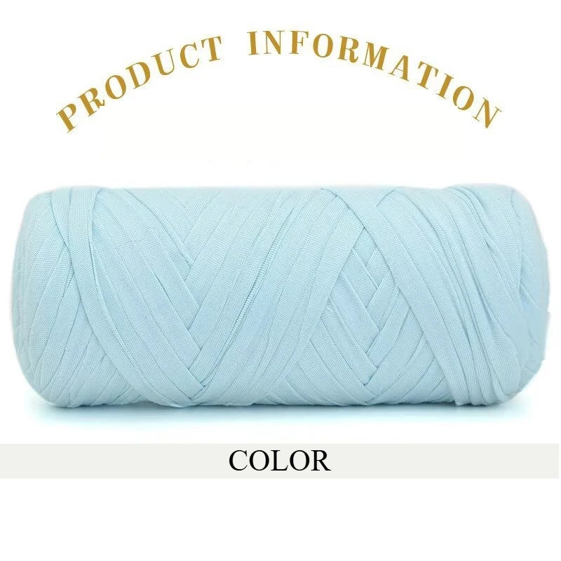 A skein of light blue thick polyester blended yarn rolled into a cylinder.