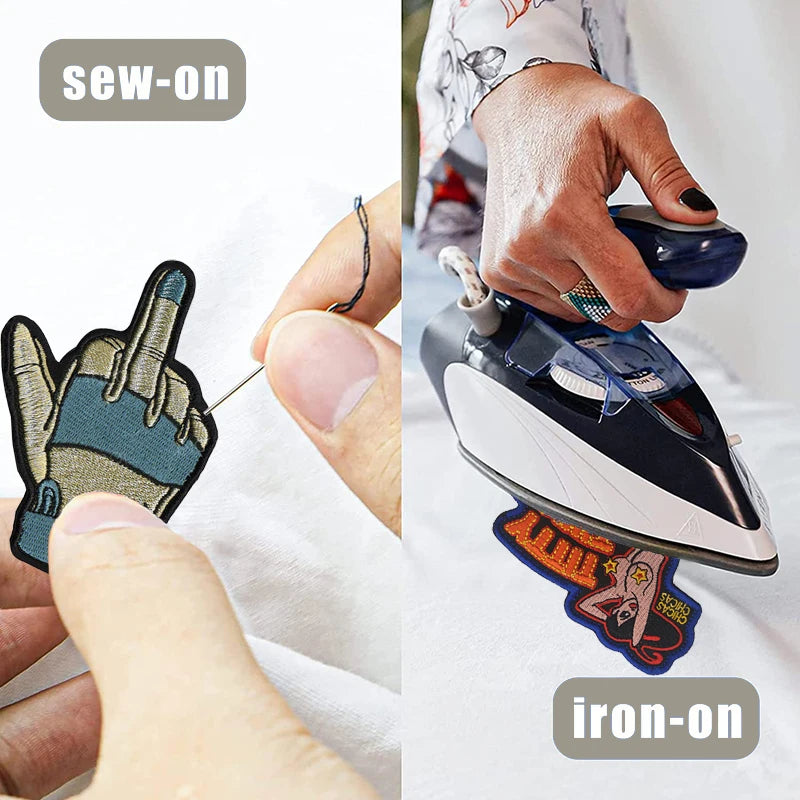 Close-up of a hand using an iron-on patch to sew on embroidery onto fabric.