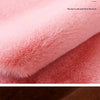 Close-up of a pink plush bear-shaped non-slip area rug showing soft, full-touch fur texture.