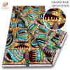 A bolt of brown and teal African wax print fabric featuring intricate geometric patterns.