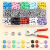 A collection of colorful metal sewing buttons in various shades and sizes arranged in a plastic kit.