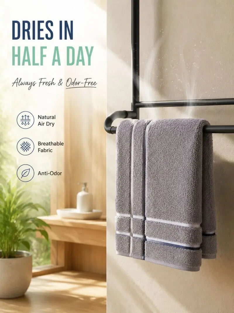 Gray face towels hanging on a rack with text promoting drying in half a day and odor-free features.