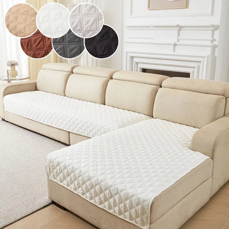 A beige sofa cushion cover with a quilted white fabric is displayed on a light-colored sofa.