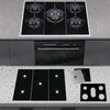 A set of black gas stove protectors and a built-in oven unit installed in a kitchen countertop.