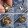 Close-up shots of gold-toned metal denim buttons sewn onto blue denim fabric.