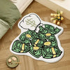A white non-slip rug featuring a design of stacked green dollar bills and a stylized money-themed cloud.