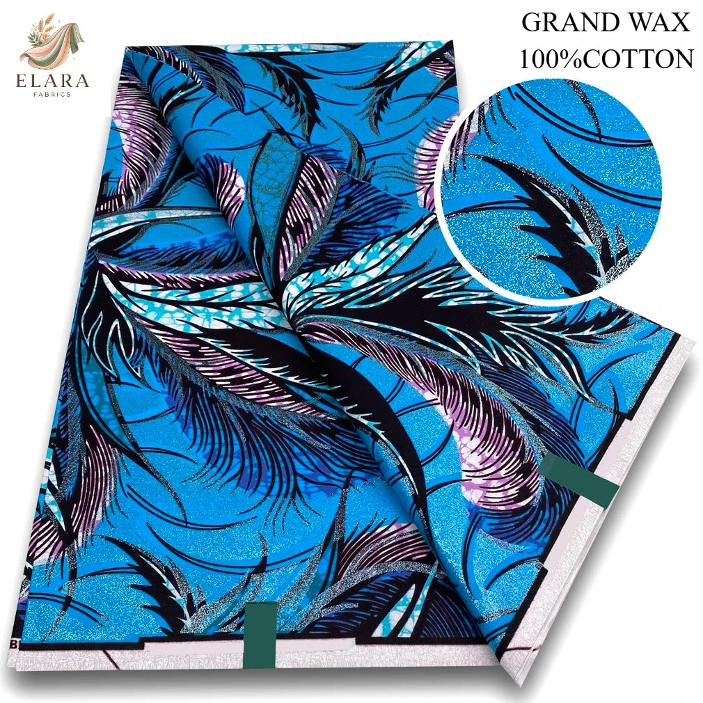 Blue and purple African wax print fabric featuring stylized feather patterns