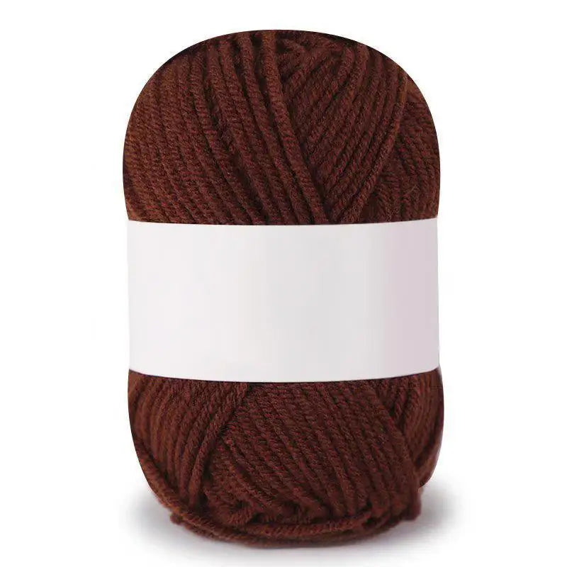 A ball of dark brown, 4ply soft milk cotton knitting yarn.