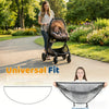A woman is holding a black universal fit mosquito net for baby strollers and car seats.