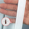 Close-up of a self-adhesive window screen mesh with a mosquito visible through the netting.