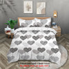 White duvet cover with gray and black heart pattern featuring two pillowcases and a quilt cover