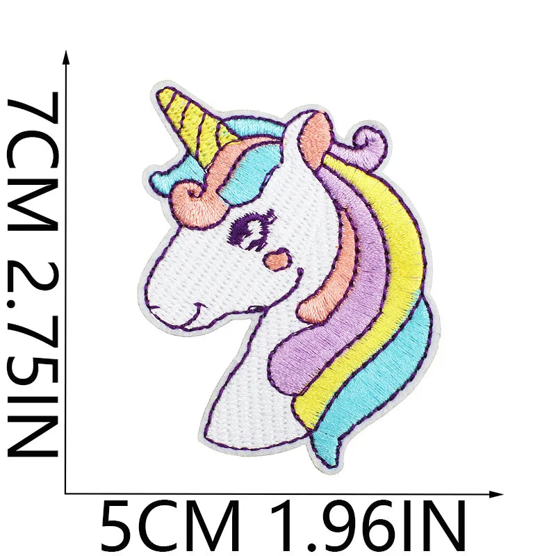 A white unicorn embroidery patch with purple and yellow accents, measuring 7cm by 5cm.