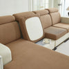 A beige jacquard elastic sofa cushion slipcover with a light cream accent and decorative piping.
