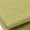 A close-up of coarse olive green linen and cotton fabric rolled up.