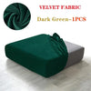 Dark green velvet fabric sofa seat covers shown on a light wooden floor.