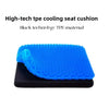 A bright blue, hexagonal TPE cooling seat cushion resting on a black surface.