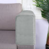 A light gray velvet sofa armrest cover is shown next to a piece of furniture.