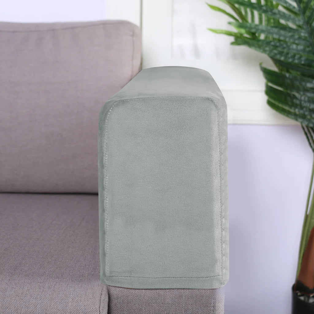 A light gray velvet sofa armrest cover is shown next to a piece of furniture.