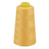 A roll of golden yellow sewing thread with a light green plastic core.