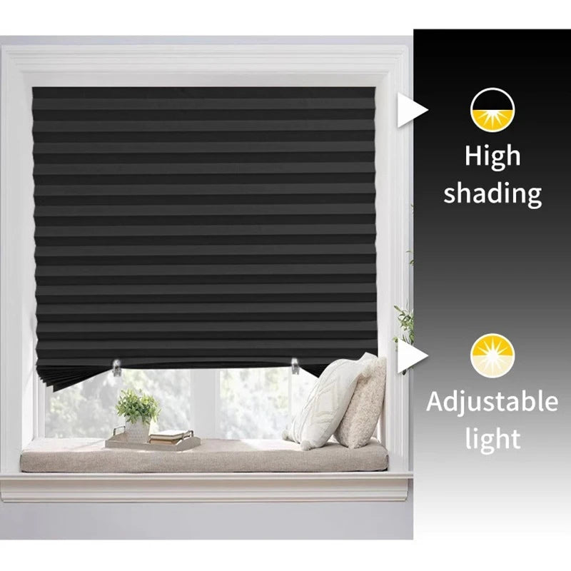 Black pleated blackout curtains installed in a window with adjustable light feature shown.