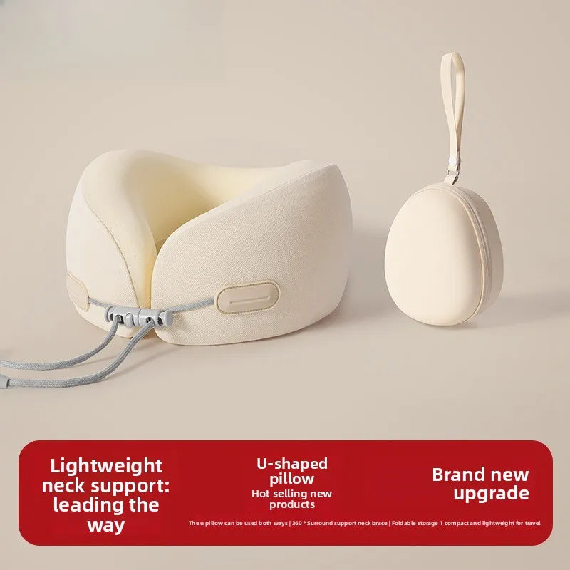 A beige U-shaped memory foam travel neck pillow with a fabric cover shown on a light background.