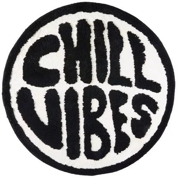 A round black and white fuzzy mat featuring the text CHILL VIBES in a distressed letter pattern.