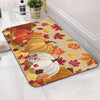 A decorative maple leaf area rug featuring autumn squash and maple leaves in orange, yellow, and red tones.