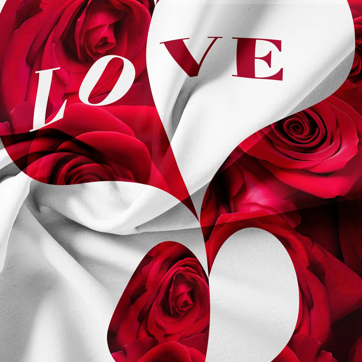 A close-up of a red floral print fabric featuring roses and the word LOVE on a white background.