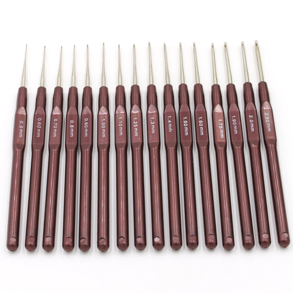 A set of sixteen ergonomic crochet hooks with soft-grip handles in various sizes and shades of brown.