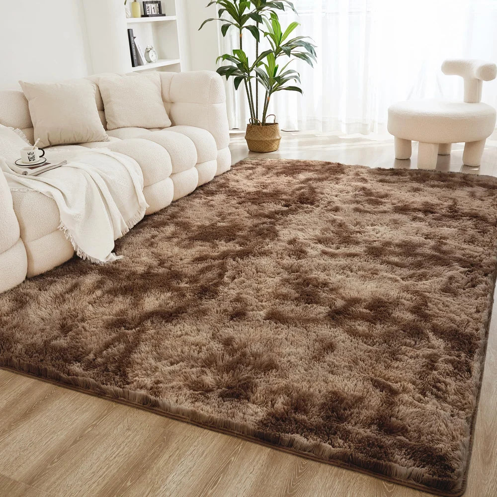 A brown shaggy rug is placed on a light wood floor in a bright living room setting.