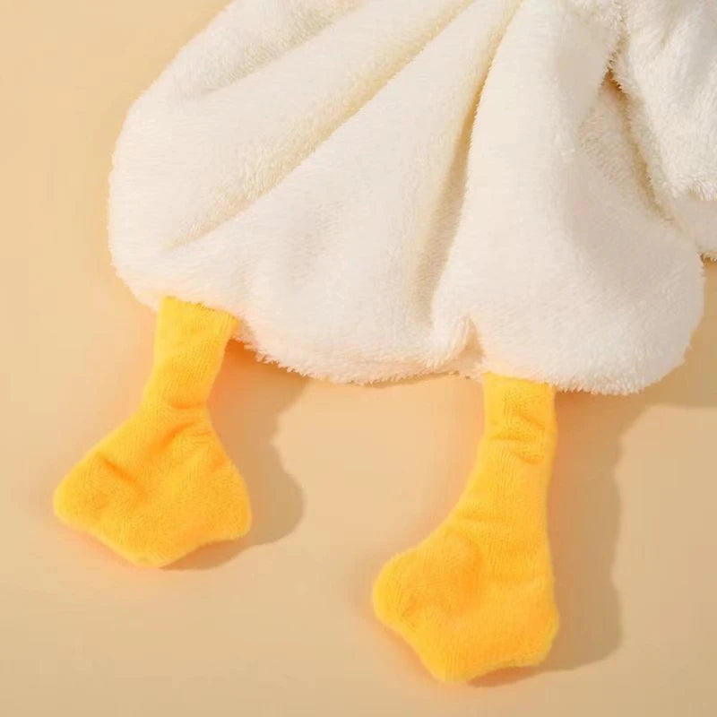A fluffy white cartoon goose hanging hand towel with bright orange feet.